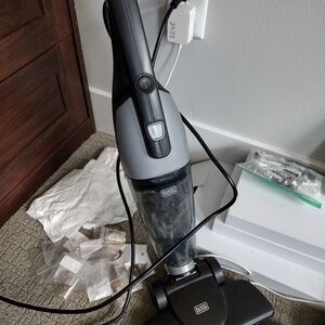 Tiny Black & Decker vacuum cleaner, swivel Head, collapses into a hand vac